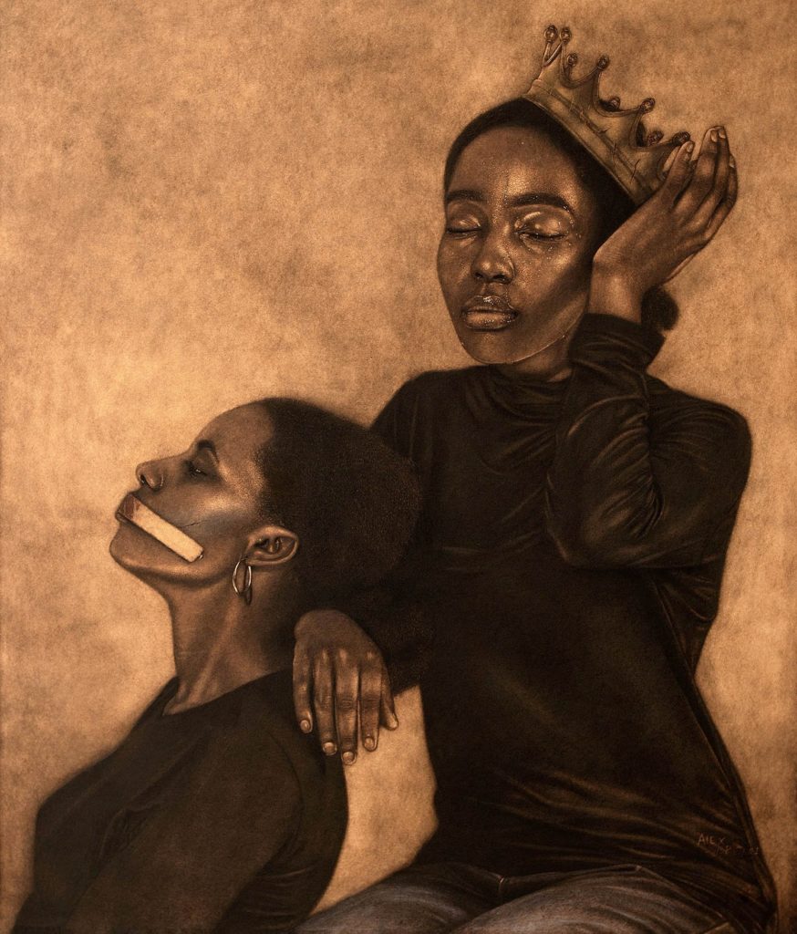 "Silent Strength" by Alex Peter
A pyrography artwork featuring two women dressed in black. One woman has a piece of tape over her mouth, symbolizing silence, while the other gently places a hand on her shoulder and adjusts a crown on her own head. The piece conveys a strong message of resilience, struggle, and empowerment.